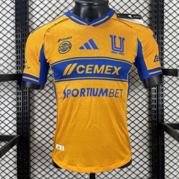 Player Version 25/26 Tigres UANL Gold with Blue Chest Band, 65th Anniversary Badge & Sportiumbet Jersey